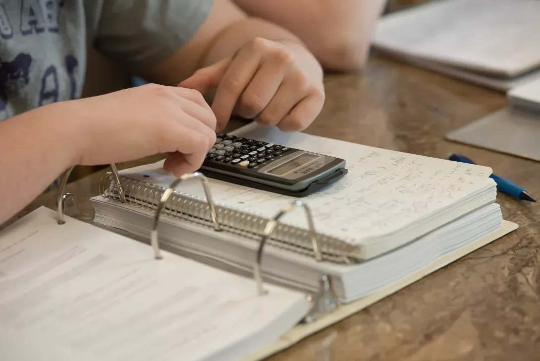 Student using a calculate